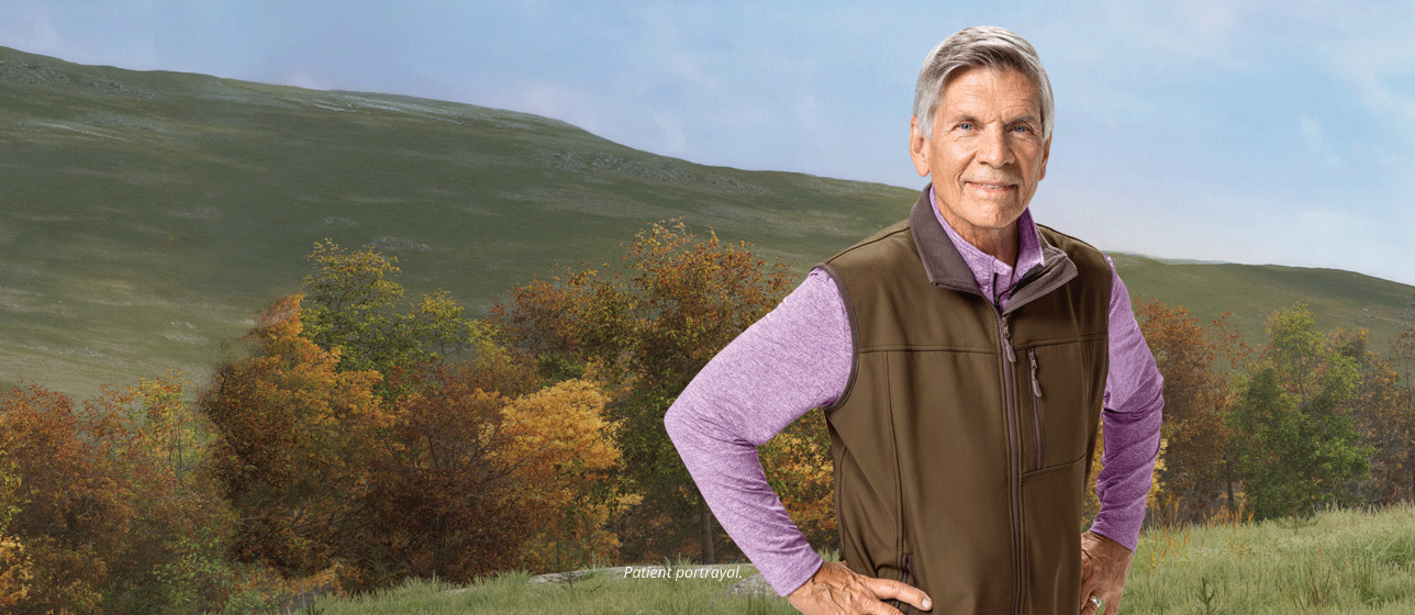 Man with vest outdoors (patient portrayal)